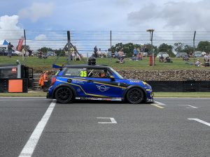 Side view of car at start line
