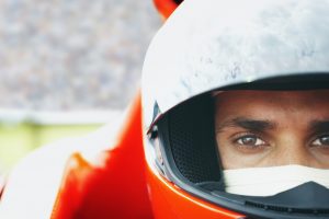 Racing driver in helmet